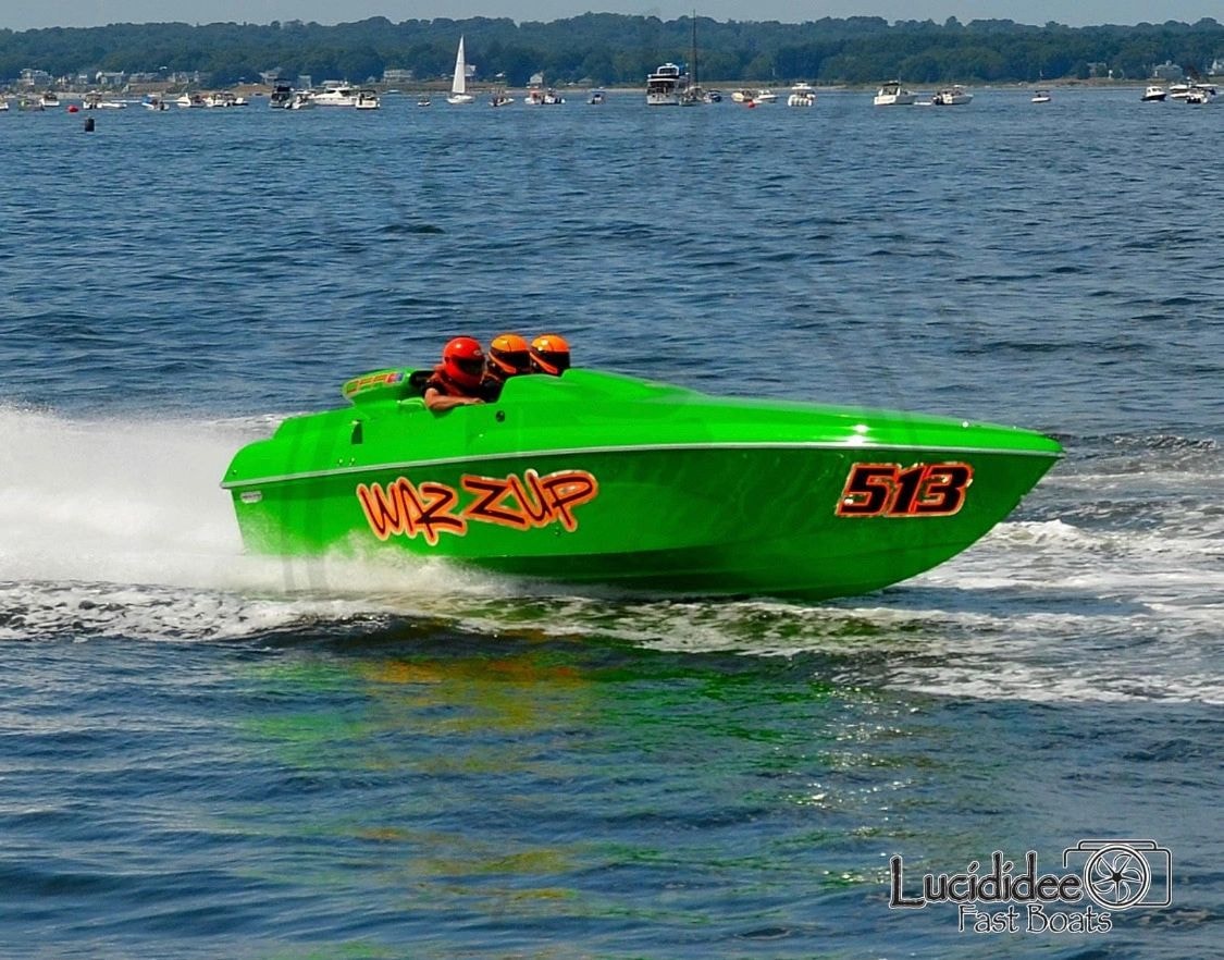Racing boat graphics by SignsandWraps