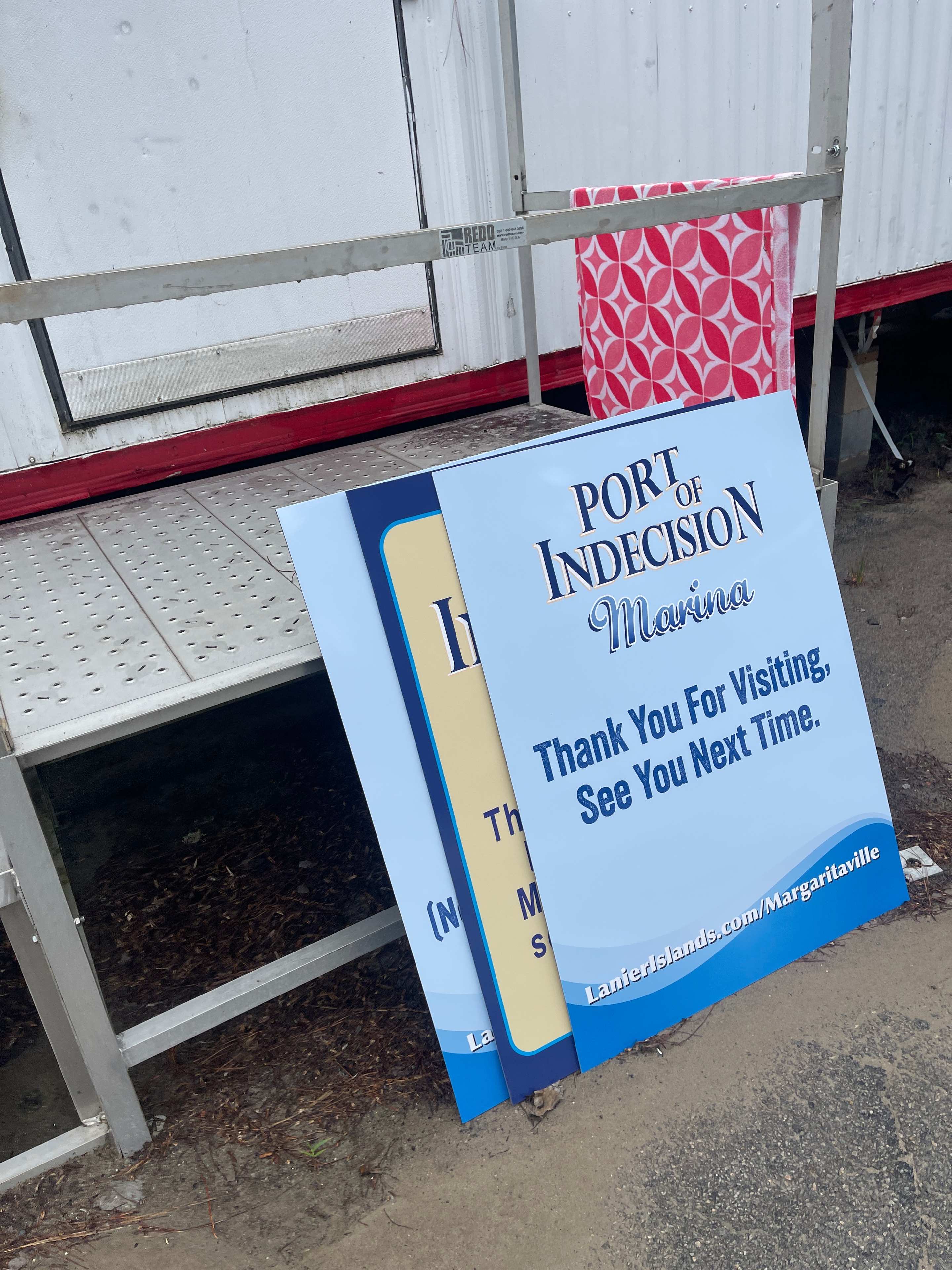 Port of Indecision Marina sign with Thank You For Visiting message and Margaritaville branding