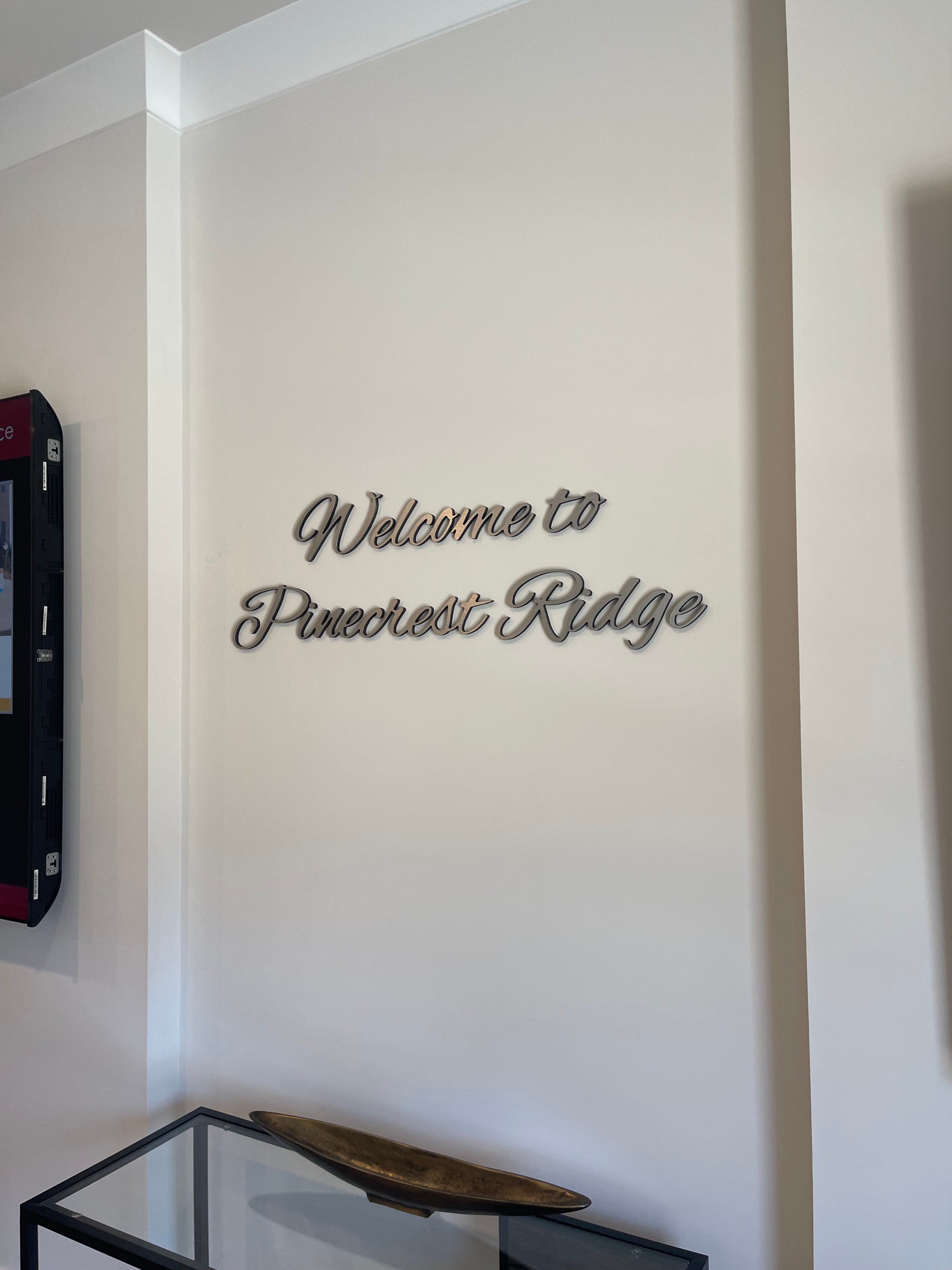 Welcome to Branding Garage 3D metal script sign mounted on interior wall