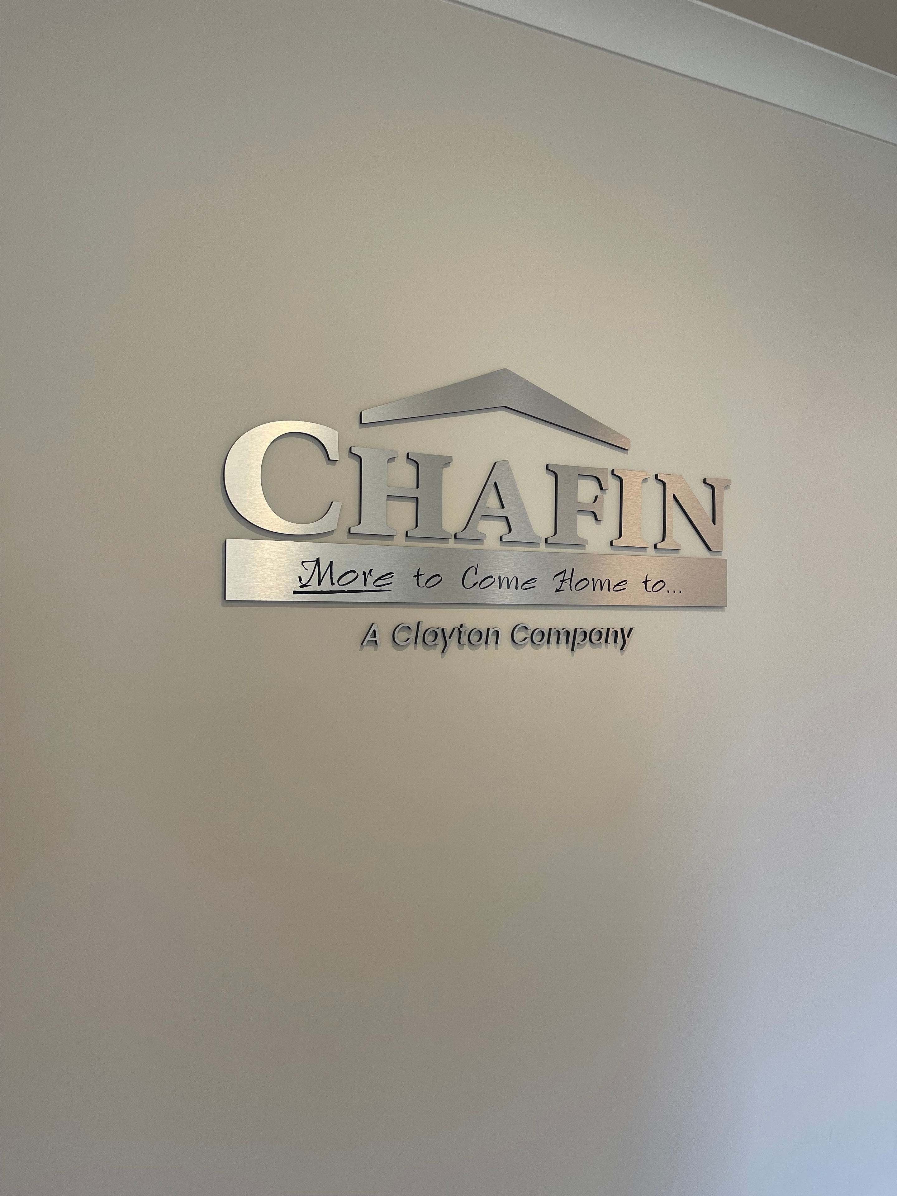 Chafin A Clayton Company frosted vinyl logo graphics applied to glass office entrance door